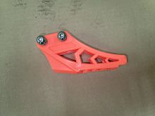 Успокоитель цепи (ловушка) для питбайка пластиковая универсальная оранжевая